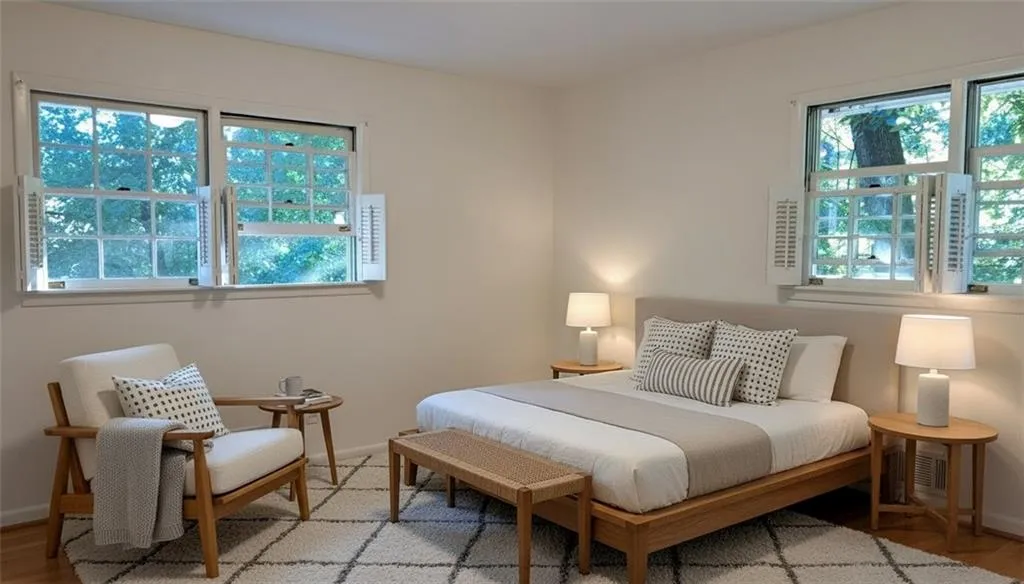 Bedroom #1 with windows on two sides of the room (front corner of house)