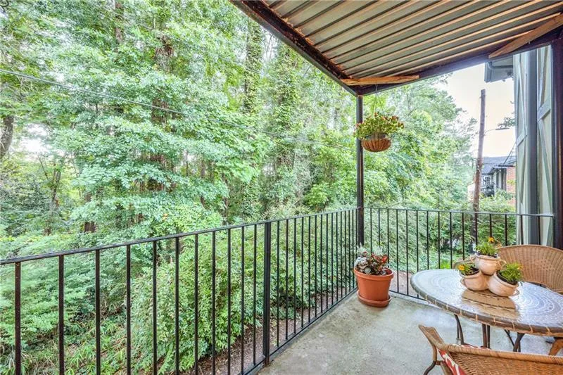 Balcony with wooded view