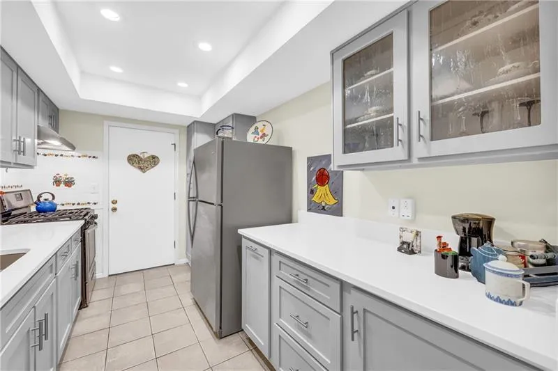 Plenty of cabinet and counter space. Custom, shaker style cabinets.