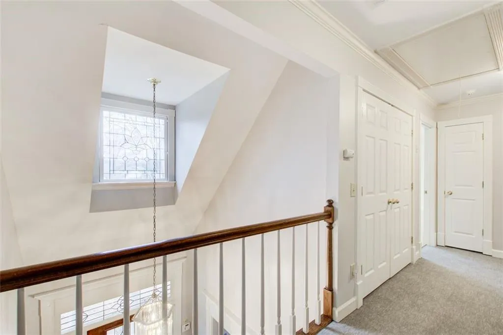 Two story foyer with beautiful windows