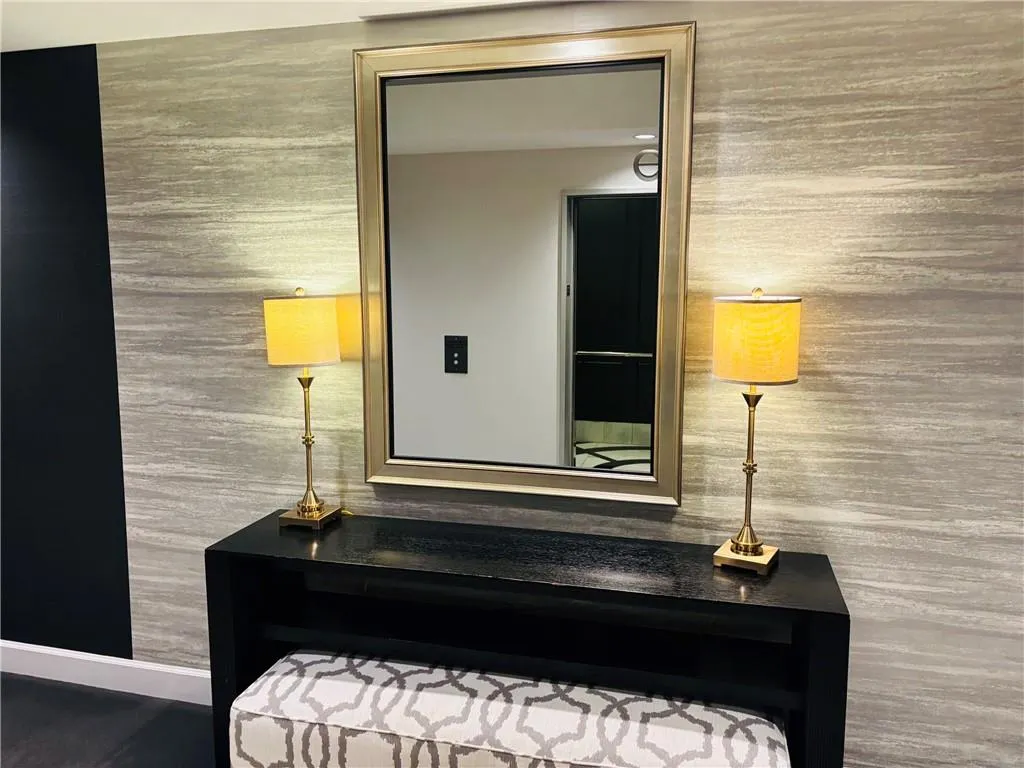 11th floor elevator view -Textured wall covering with a metallic finish
