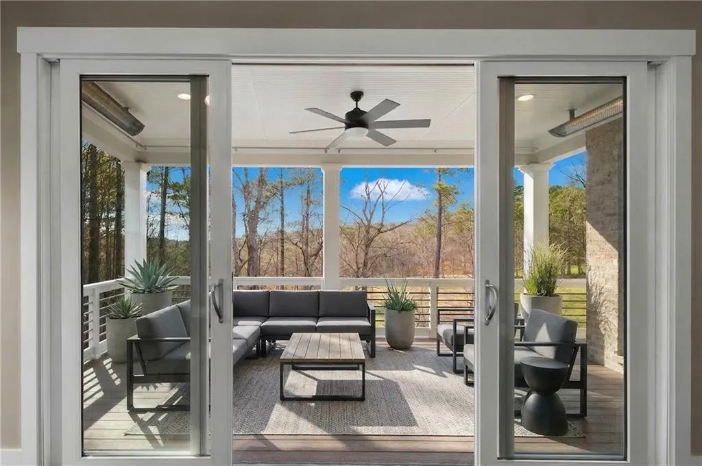 Sunroom featuring hardwood / wood-style flooring