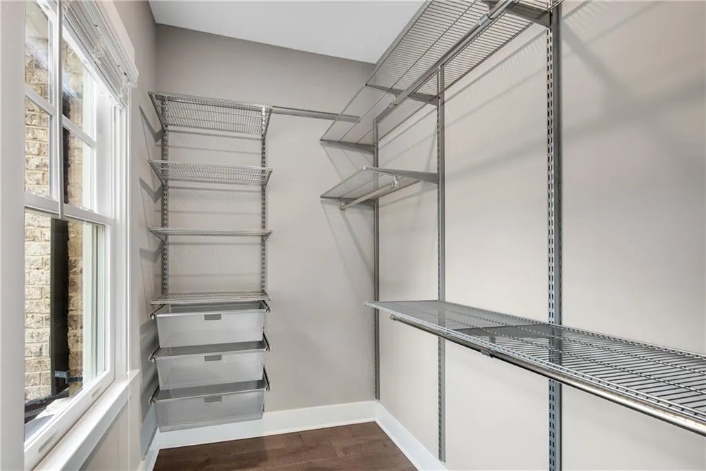 All bedrooms have large closets with custom shelving