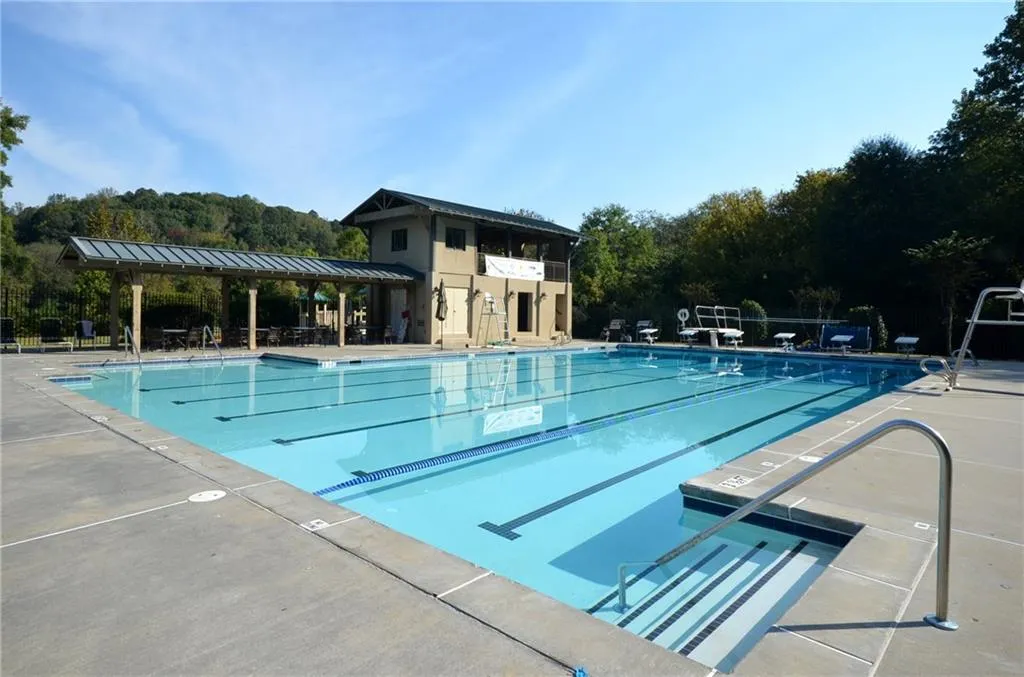 Community pool featuring a patio area