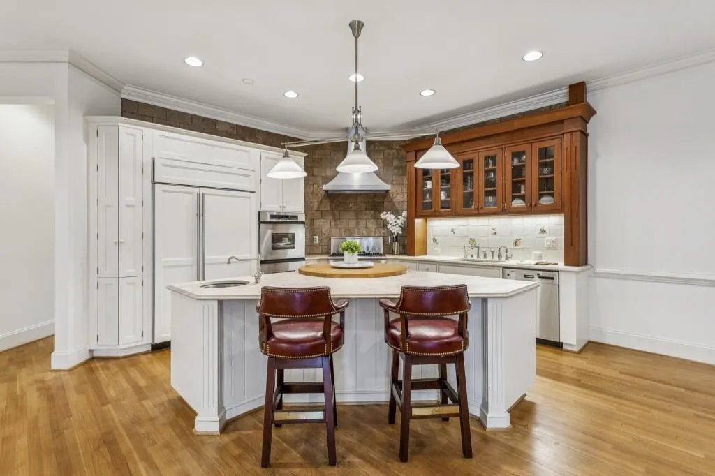 Kitchen With Quartz Counters, Paneled Sub-Zero Refrigerator, Premium Thermador Range, & Island