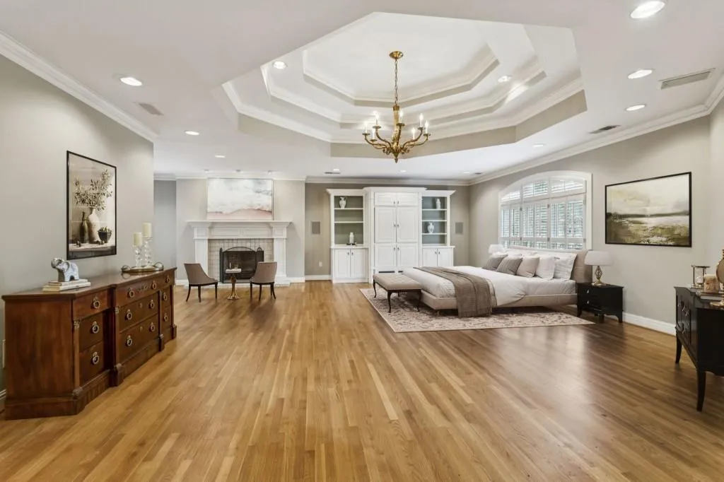 Luxurious Primary Suite With A Sitting Room With A Fireplace, Walk-In Closet, & Spa-Style Ensuite