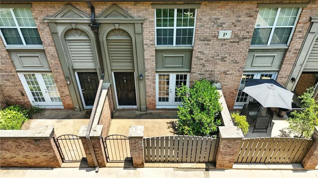 Entrance to property featuring a gate