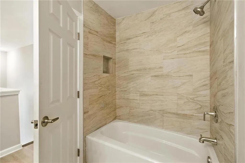 Full bathroom with  shower combination