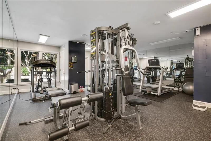 Gym featuring baseboards