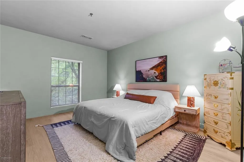 Bedroom with wood finished floors