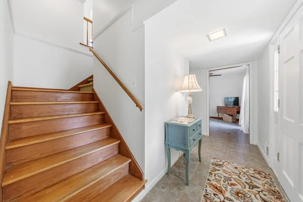 Foyer with ceramic tile flooring