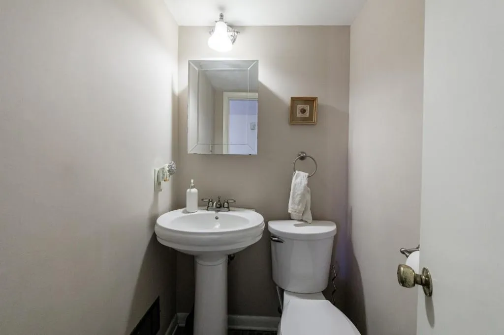 Main level half bath/powder room