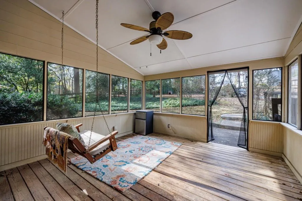 Screened in porch off the kitchen