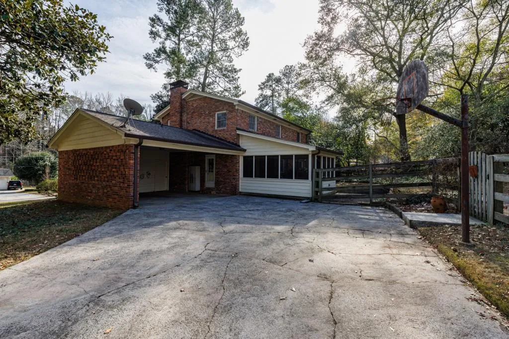 Large driveway and carport