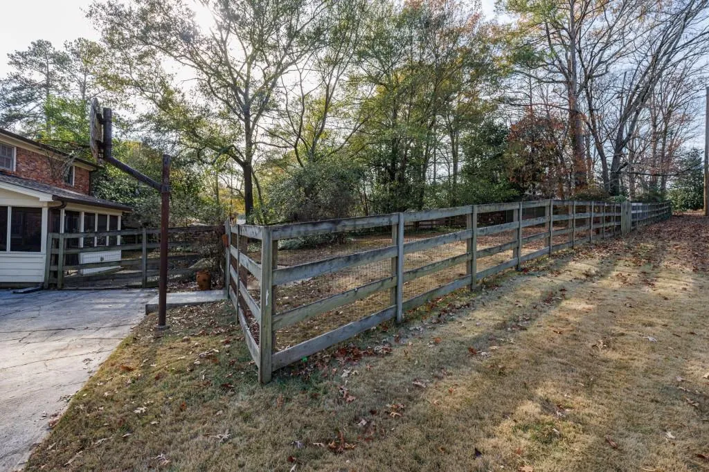 Large, level fenced backyard