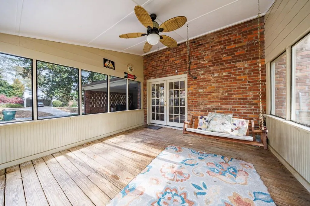 Screened in porch off the kitchen