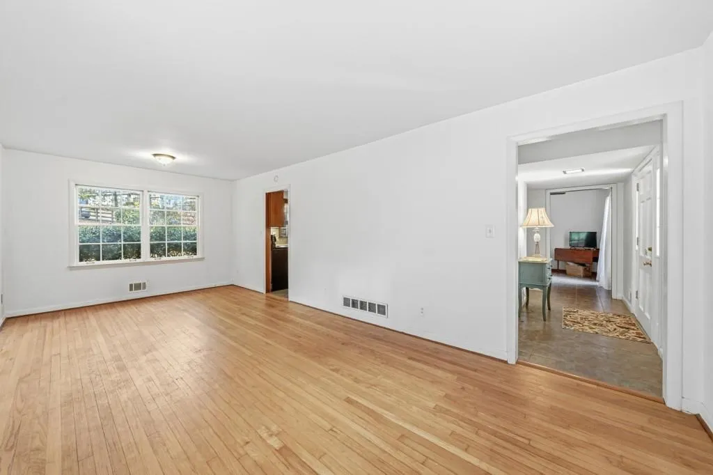 Dining/Living Room combo with hardwood floors
