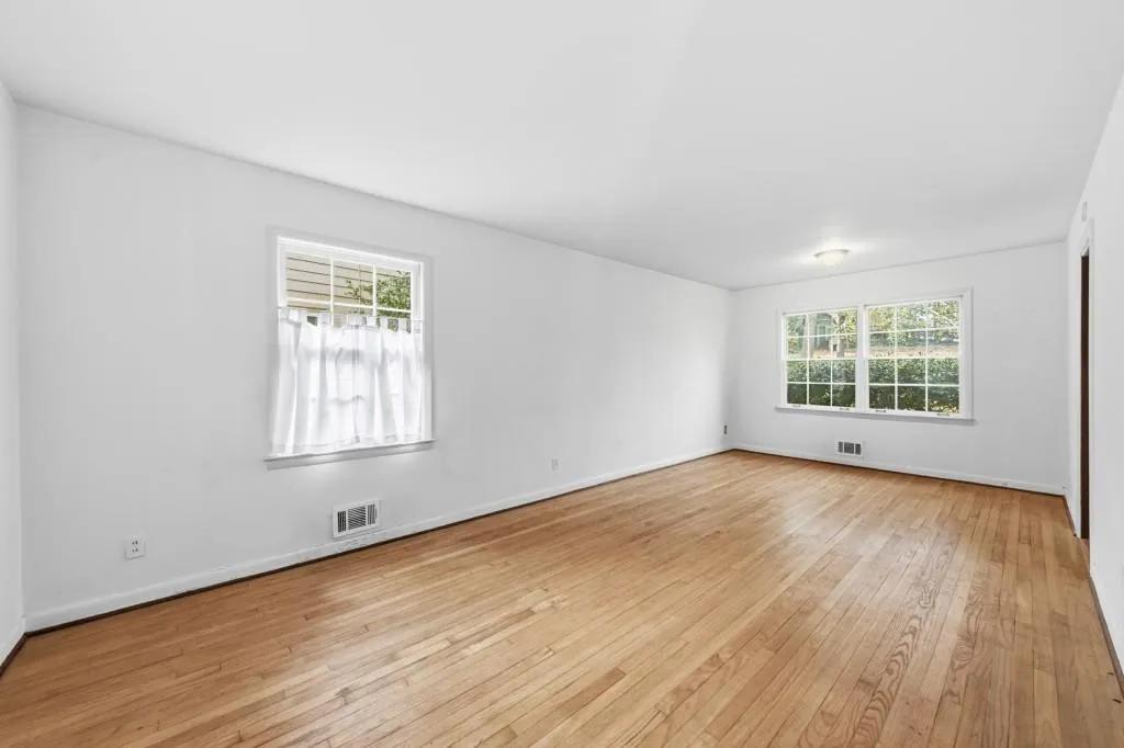 Dining/Living Room combo with hardwood floors