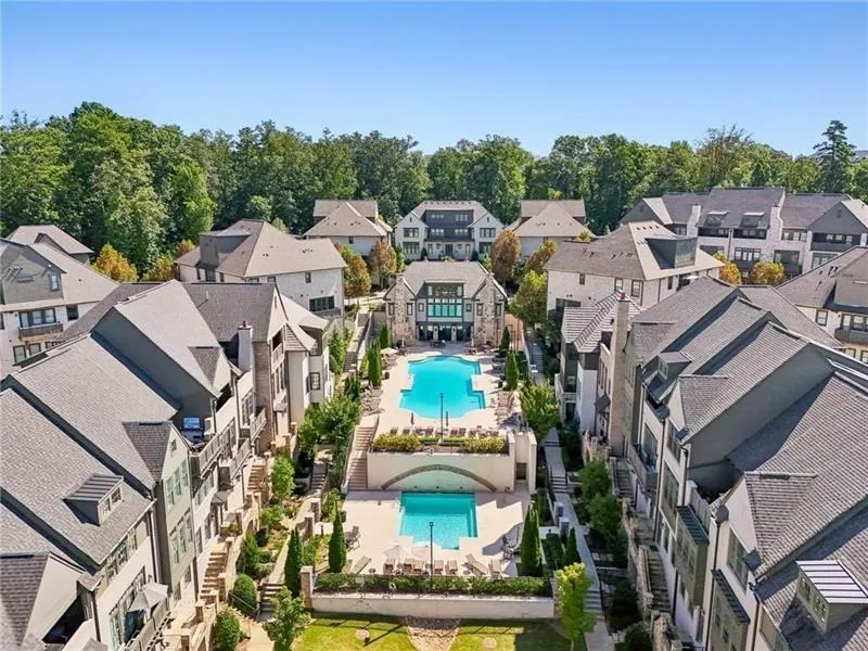 Aerial perspective of suburban area with a pool area