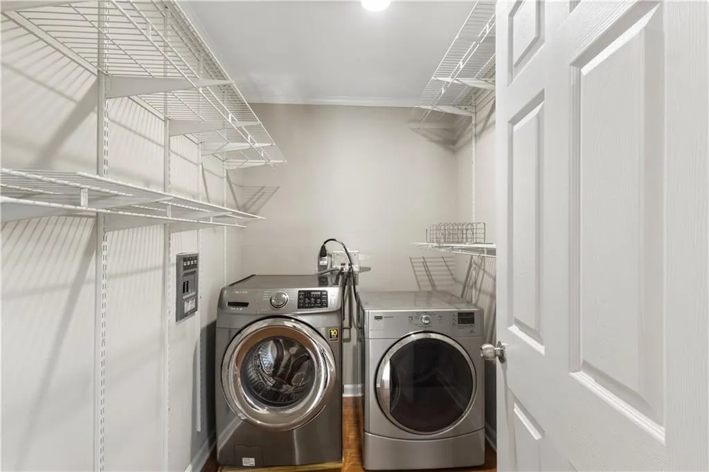 Laundry area featuring separate washer and dryer