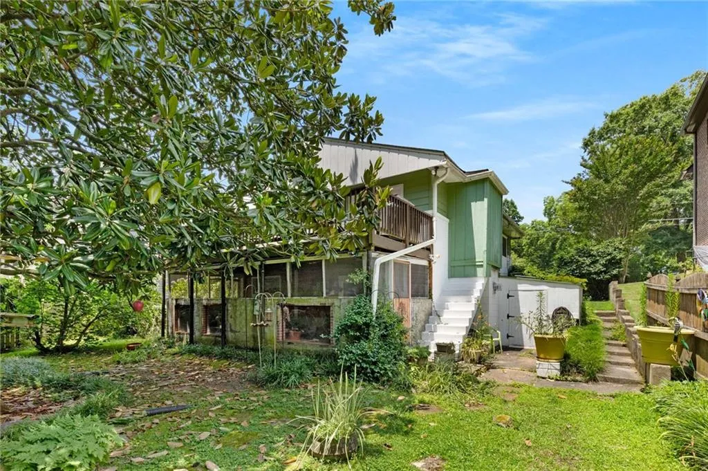 Back of property with stairs