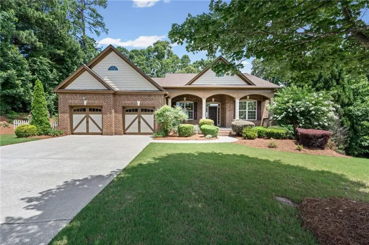 FRONT ELEVATION OF HOME LOCATED ON A QUIET, LEVEL CUL-DE-SAC STREET.