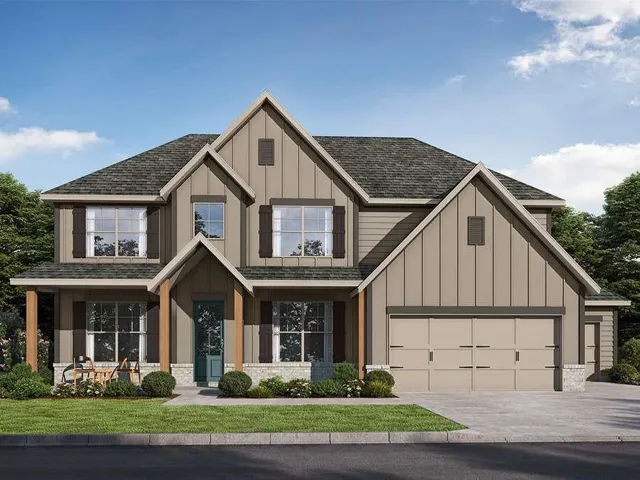 Two-story exterior with board and batten siding, stone accents, a covered entry with wood columns, and a two-car garage