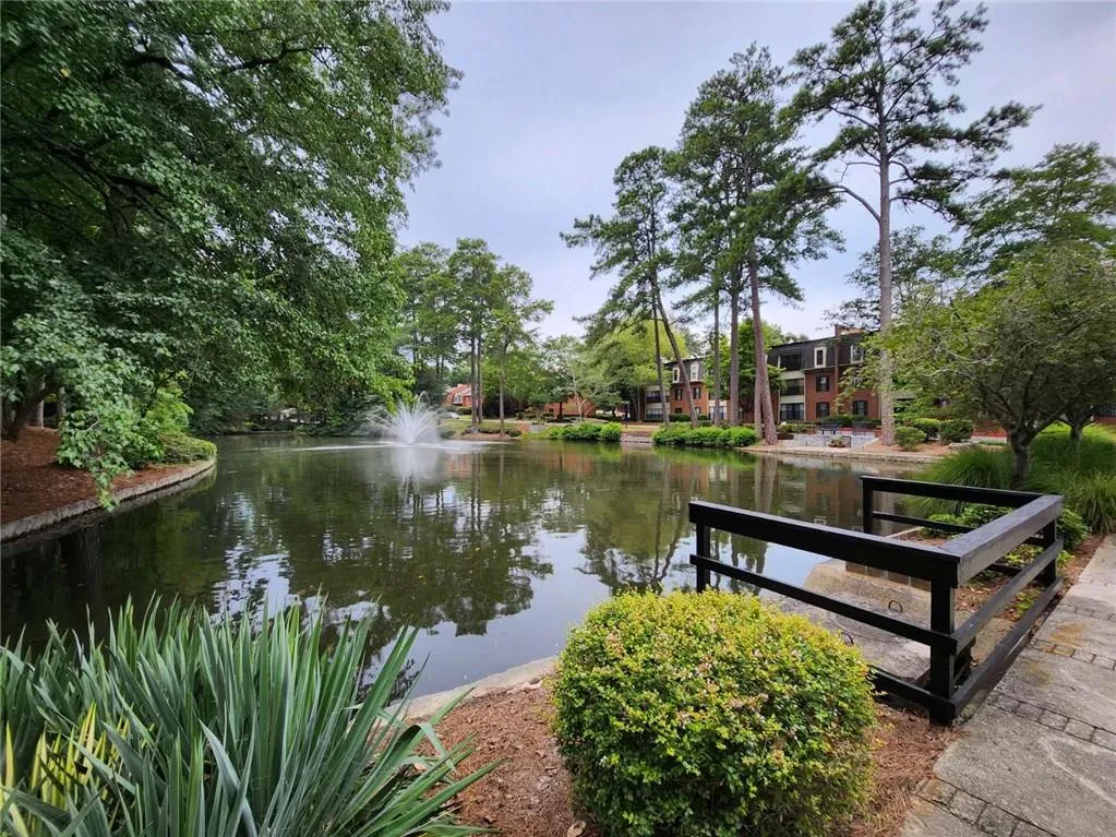 View of community with a water view