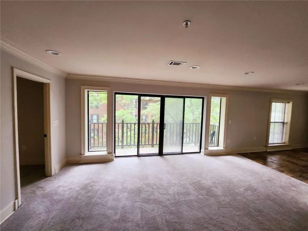 Carpeted living room.  5 years old