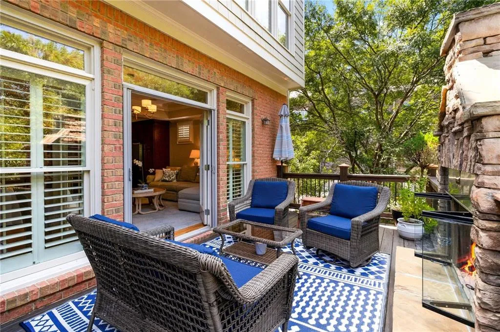 View of patio with an outdoor hangout area