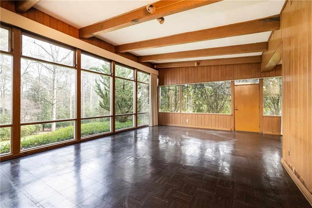 Formal living room iwth full height glass and stunning views to property
