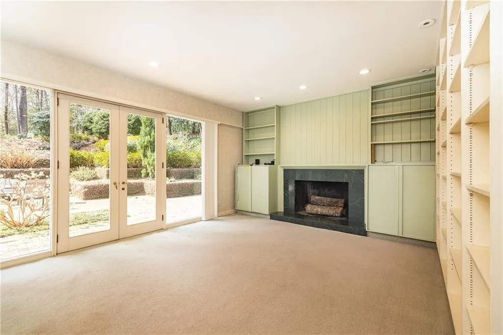 Family Room with fireplace opens to patio