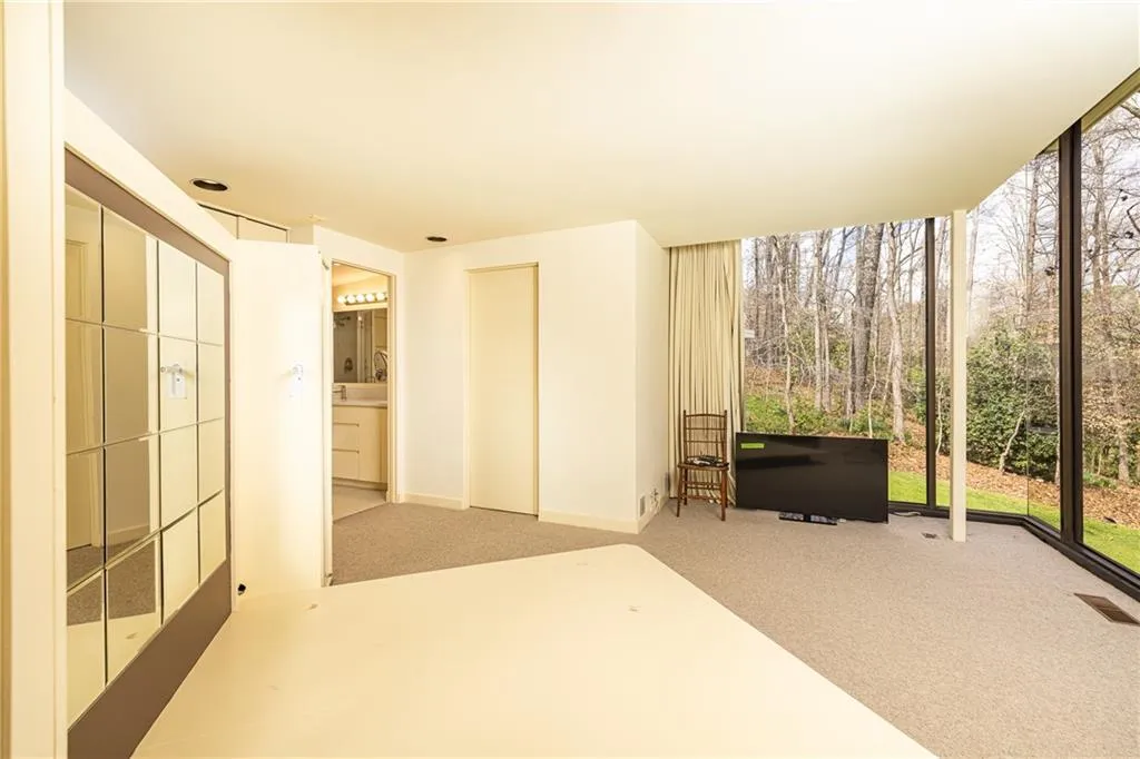 View to closet and primary bedroom