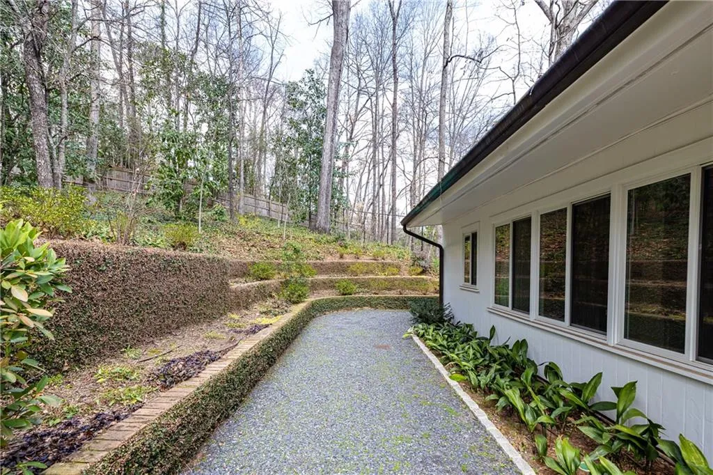 Stone walkway behind home