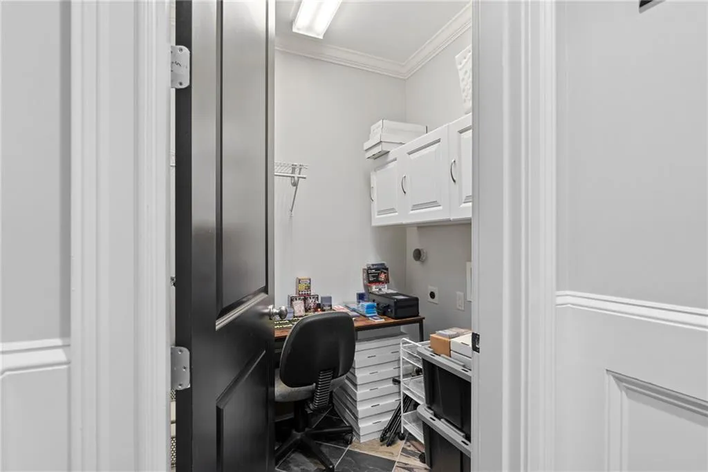 Terrace level laundry room - currently being used as an office