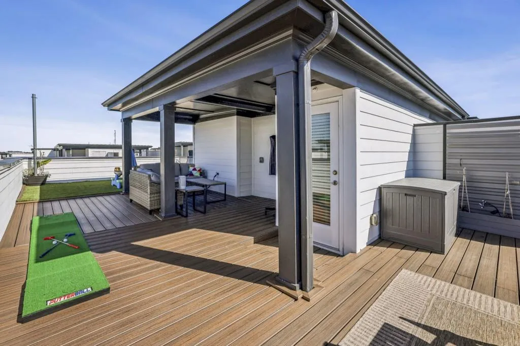 Head up to the Private Rooftop Deck   a true showstopper! Enjoy City Views, a Partially Covered Lounge Area perfect for game days, Artificial Turf for Play, and plenty of space for a Dining Set or Outdoor Kitchen.