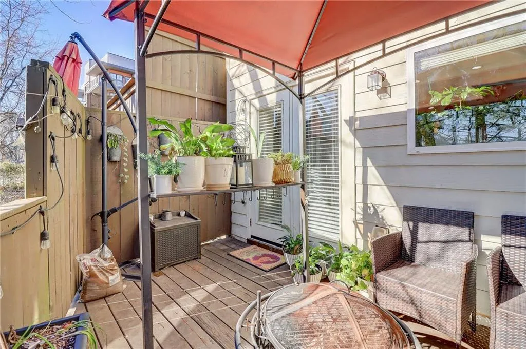 Wooden terrace featuring a gazebo