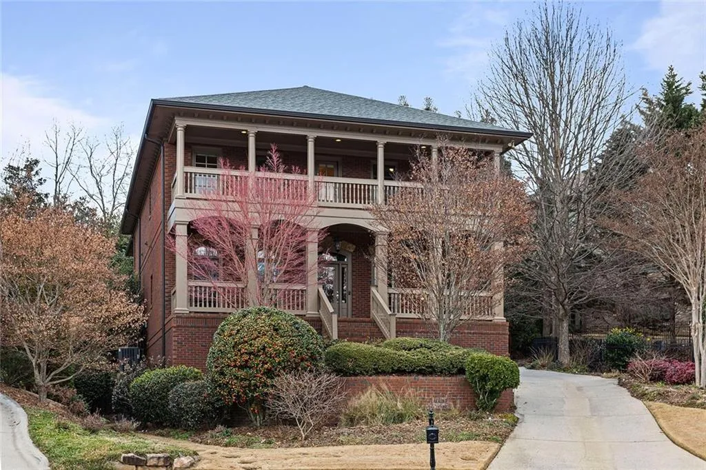 View of front facade featuring double porches