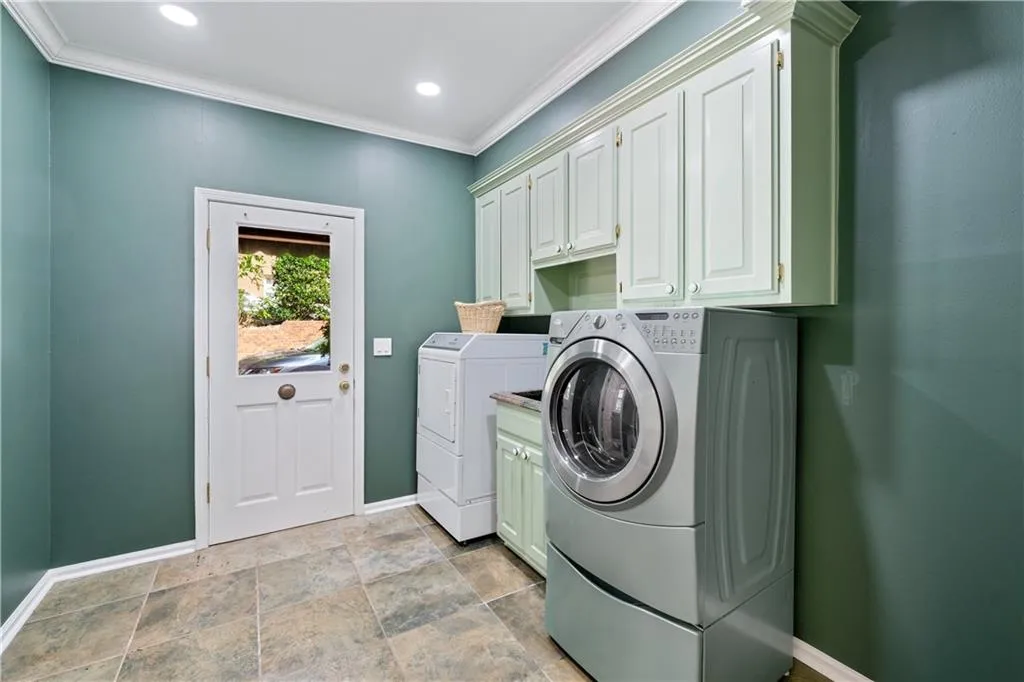 Deluxe Laundry Room wirh Washer and Dryer