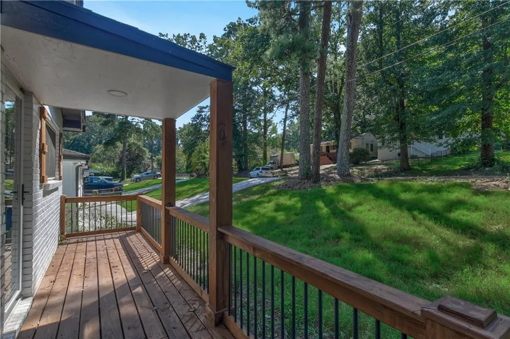 Wooden deck with a lawn