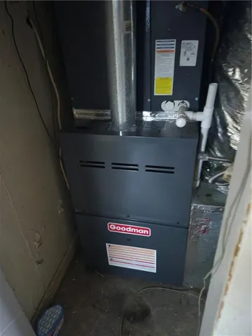 Goodman brand HVAC system with galvanized ductwork and PVC plumbing