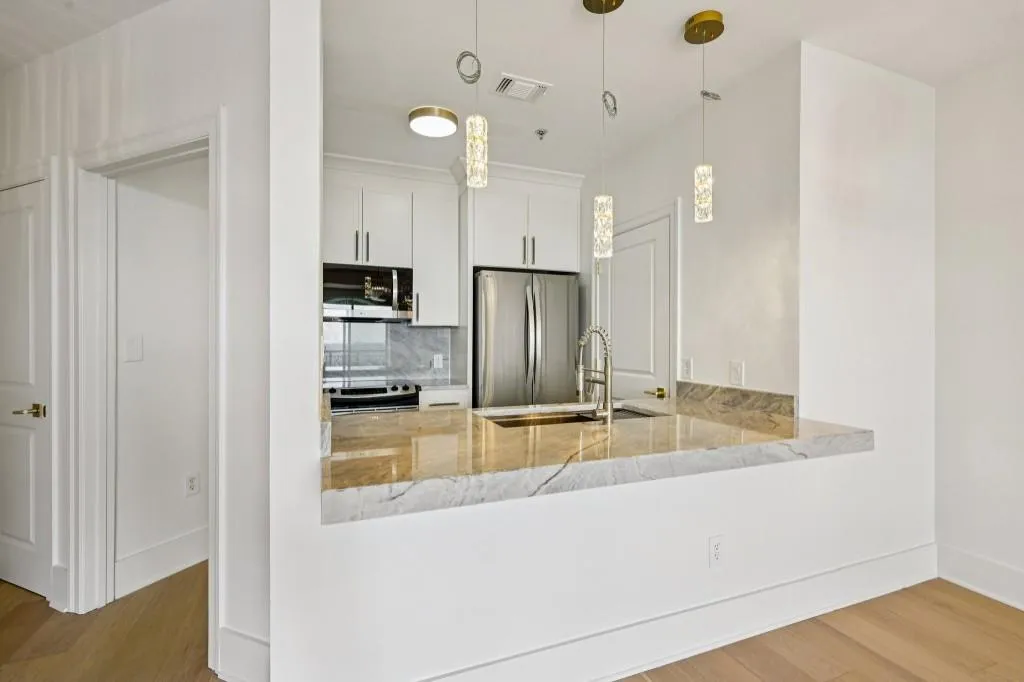 Thoughtfully Designed With Sleek Cabinetry, Stone Countertops & Stainless Steel Appliances!