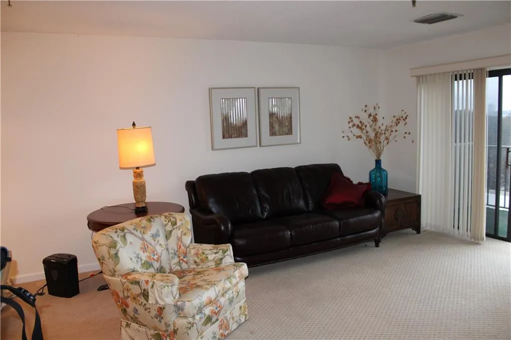 Living room featuring carpet