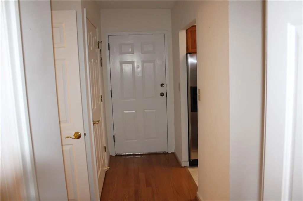 Corridor with wood flooring