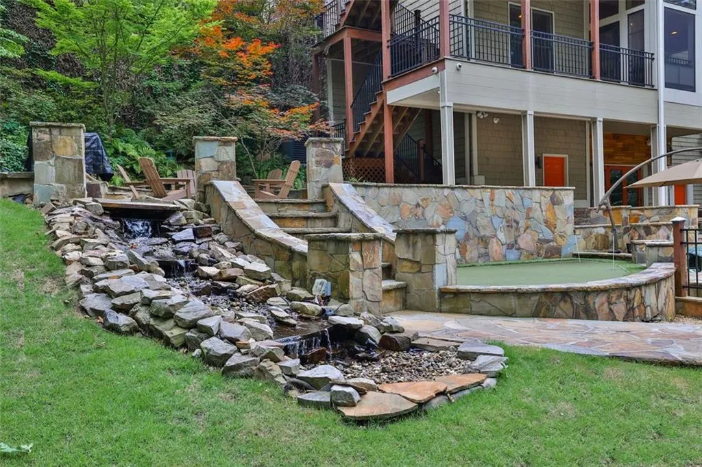 Outdoor water feature with natural rock