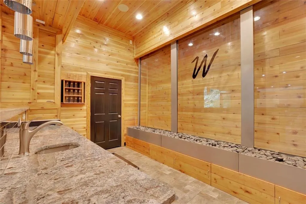 Water feature (sub basement level) that can be easily personalized (fat head type cling)