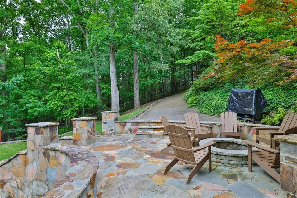 View of patio / terrace with an outdoor fire pit