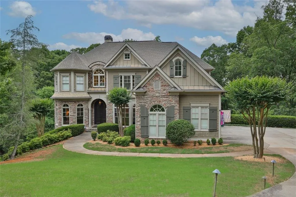 View of front of property with a front yard