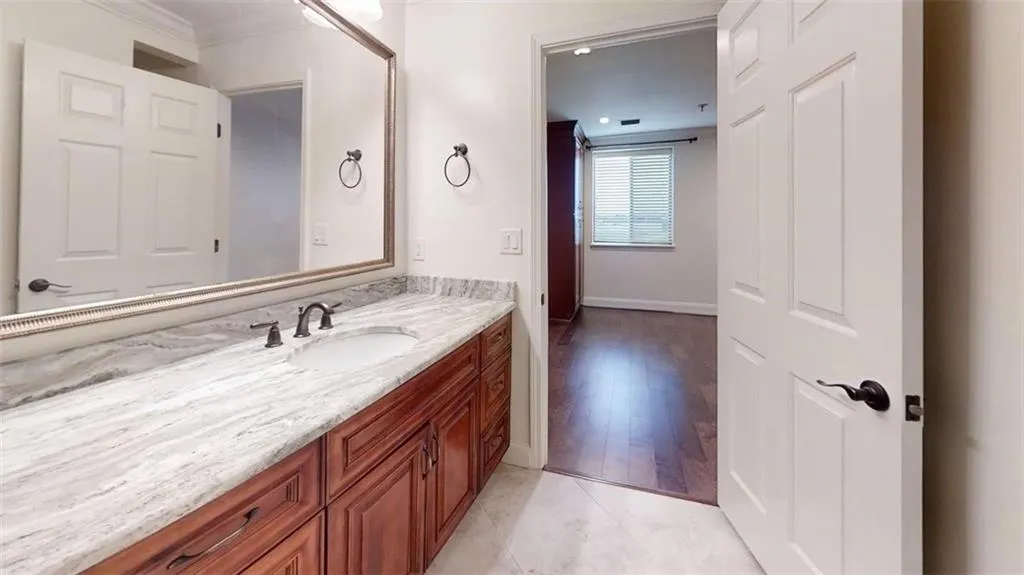 Bathroom featuring vanity and light tile patterned floors