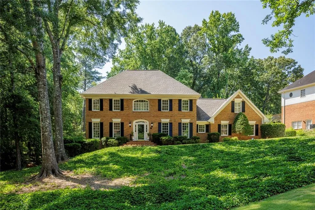 Four-sided brick on 1+ acre lot.